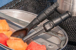Food and water approved Grilamid construction. The Tactical Spork is equipped with a fork/spoon combo and has a 2.5” plastic serrated blade in the handle. The blade is accessed by pulling the spork apart from the extreme ends.